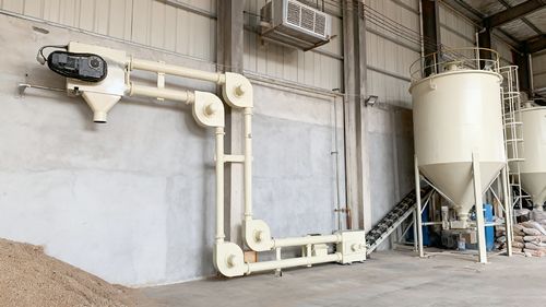 環境マテリアルハンドリングにおけるチューブチェーンコンベアの成功事例